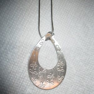 Silver colored engraved teardrop pendant